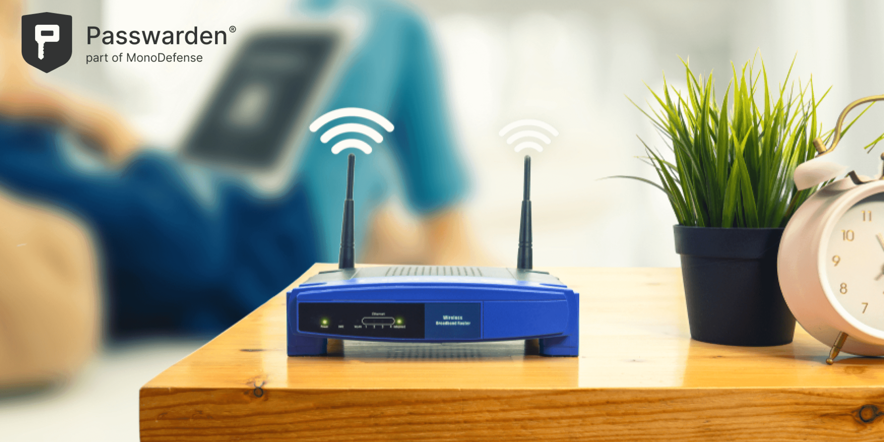 Closeup of a wireless router and a man using smartphone, how to change WiFi password
